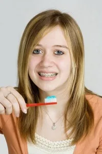 Brushing_girl_braces-199x300