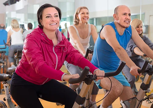 older people do sports on exercise bikes