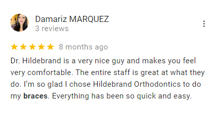 Five-star review from Damariz Marquez praising Dr. Hildebrand and Hildebrand Orthodontics staff, posted 8 months ago.
