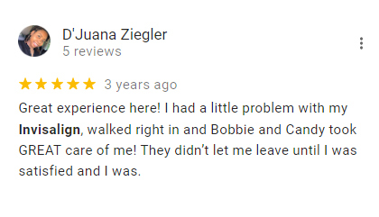 Five-star review from D'Juana Ziegler praising Invisalign care and staff at orthodontics practice.